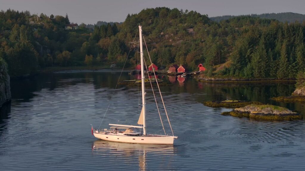 Sailing yacht on a still Norwegian fjord